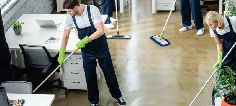 Industrial cleaning team performing deep cleaning